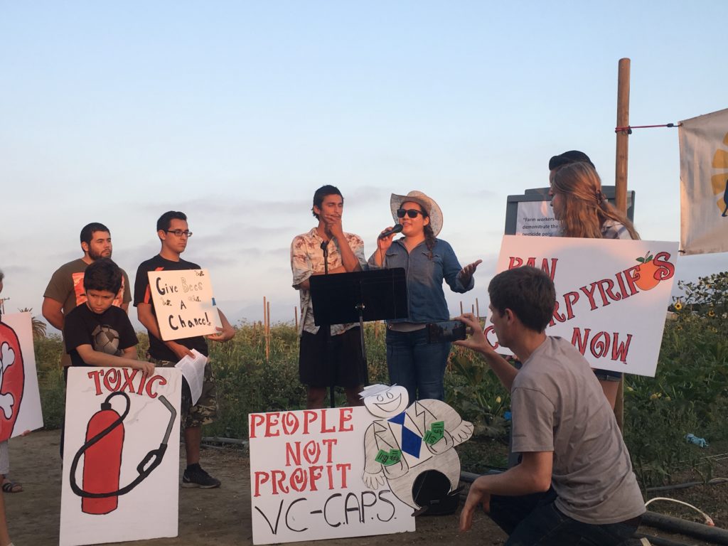 Press conference with protest signs