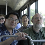 Craig Wong and Timothy Gorringe on the bus headed out to a site visit.
