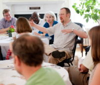 Peter Slade speaks to the group